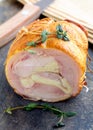 Baked pork roll filled with herbs Royalty Free Stock Photo