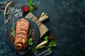 Baked pork roll with mustard and spices. Royalty Free Stock Photo