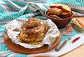 Baked pork on round board.