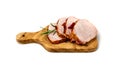 Baked Pork Slices on Wooden Cutting Board. Roasted Sliced Loin, Tenderloin Ham Piece Royalty Free Stock Photo