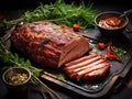 Baked Pork Slices on Wooden Table. Roasted Sliced Loin, Tenderloin Ham Piece, Baked Meat Fillet Royalty Free Stock Photo