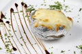 Baked potato in foil with cheese