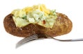 Baked potato with fork isolated Royalty Free Stock Photo