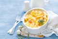 Baked potato gratin with garlic, cream and cheese, traditional french cuisine