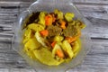 Baked potato slices, onion, carrot, pieces of beef meat, zucchini, spices, garlic, paprika and laurel, potatoes with beef meat Royalty Free Stock Photo