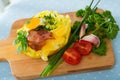 Baked potato stuffed with herbs, egg, bacon Royalty Free Stock Photo