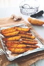 Baked potato wedges on tray - homemade wedges snack. Healthy