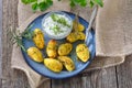 Baked potatoes with herb curd