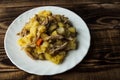 Baked potatoes with meat, carrots and onions Royalty Free Stock Photo