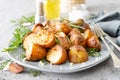 Baked potatoes with rosemary, thyme and garlic Royalty Free Stock Photo