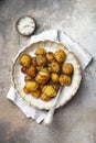 baked potatoes with thyme, rosemary and garlic Royalty Free Stock Photo