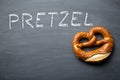 Baked pretzel on a chalkboard