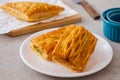 Baked puff pastry on white plate Royalty Free Stock Photo