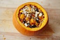 Baked Pumpkin with Rice and Fruits Stuffing Royalty Free Stock Photo