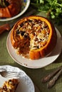 Baked Pumpkin with Rice and Fruits Stuffing Royalty Free Stock Photo