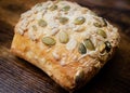 Baked pumpkin sunflower seed bread roll Royalty Free Stock Photo