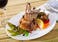 Baked rack of lamb with glass of red wine Royalty Free Stock Photo