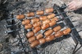 Baked red sausage on fire Royalty Free Stock Photo