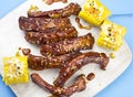Baked ribs with sesame seeds, corn