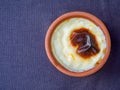 Baked rice pudding turkish milky dessert sutlac in earthenware casserole