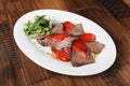 Baked roast beef with rucola and bell pepper