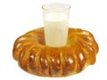 Baked roll with a glass of milk Royalty Free Stock Photo