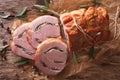 Baked Roll of pork stuffed with sage close up on the table. horizontal top view Royalty Free Stock Photo