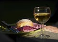 Baked roll and white wine Royalty Free Stock Photo