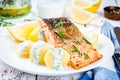 Baked salmon fillet and boiled potatoes Royalty Free Stock Photo