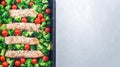 Baked salmon fillet with broccoli and tomato on frying tray, horizontal, top view, copy space Royalty Free Stock Photo