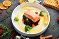Baked salmon fillet with wild rice and vegetables. Royalty Free Stock Photo
