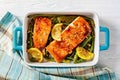 Baked salmon fish fillet with asparagus and lemon