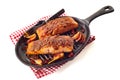 Baked salmon with fork in black pan Royalty Free Stock Photo