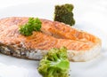 Baked salmon with fresh green broccoli on plate Royalty Free Stock Photo