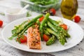 Baked salmon garnished with asparagus