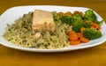 Baked salmon on long and wild rice Royalty Free Stock Photo