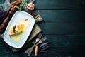 Baked salmon with spinach in dough. In the plate. Top view. Royalty Free Stock Photo