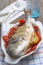 Baked sea bream with vegetables
