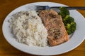 baked season salmon with rice and broccoli