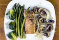 Baked season salmon with asparagus and brussel sprouts