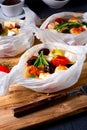 Baked small dumplings with zucchini tomatoes and diced sheep`s cheese Royalty Free Stock Photo