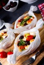 A baked small dumplings with zucchini tomatoes and diced sheep`s cheese Royalty Free Stock Photo