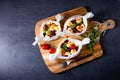 A baked small dumplings with zucchini tomatoes and diced sheep`s cheese Royalty Free Stock Photo