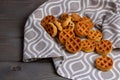 baked small soft waffles on a towel on a wooden table Royalty Free Stock Photo
