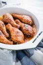 Baked spicy chicken legs with sesame