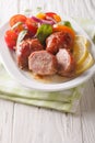 Baked spicy rabbit fillet and fresh salad of tomatoes, peppers,