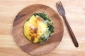 Baked spinach and cheese on plate Royalty Free Stock Photo