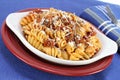 Baked spriral rotelle pasta in meat sauce