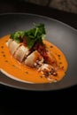 Baked squid stuffed with vegetables and sauce. Stuffed calamari Royalty Free Stock Photo