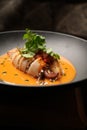 Baked squid stuffed with vegetables and sauce. Stuffed calamari Royalty Free Stock Photo